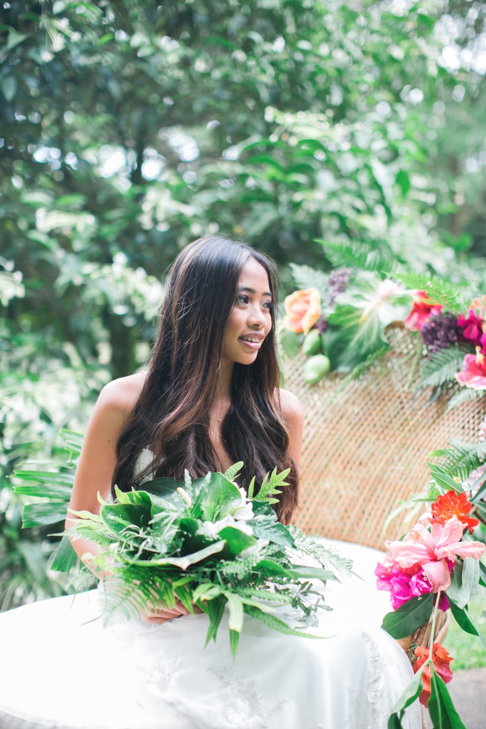 Smiling bride with green bouquet garden wedding photo