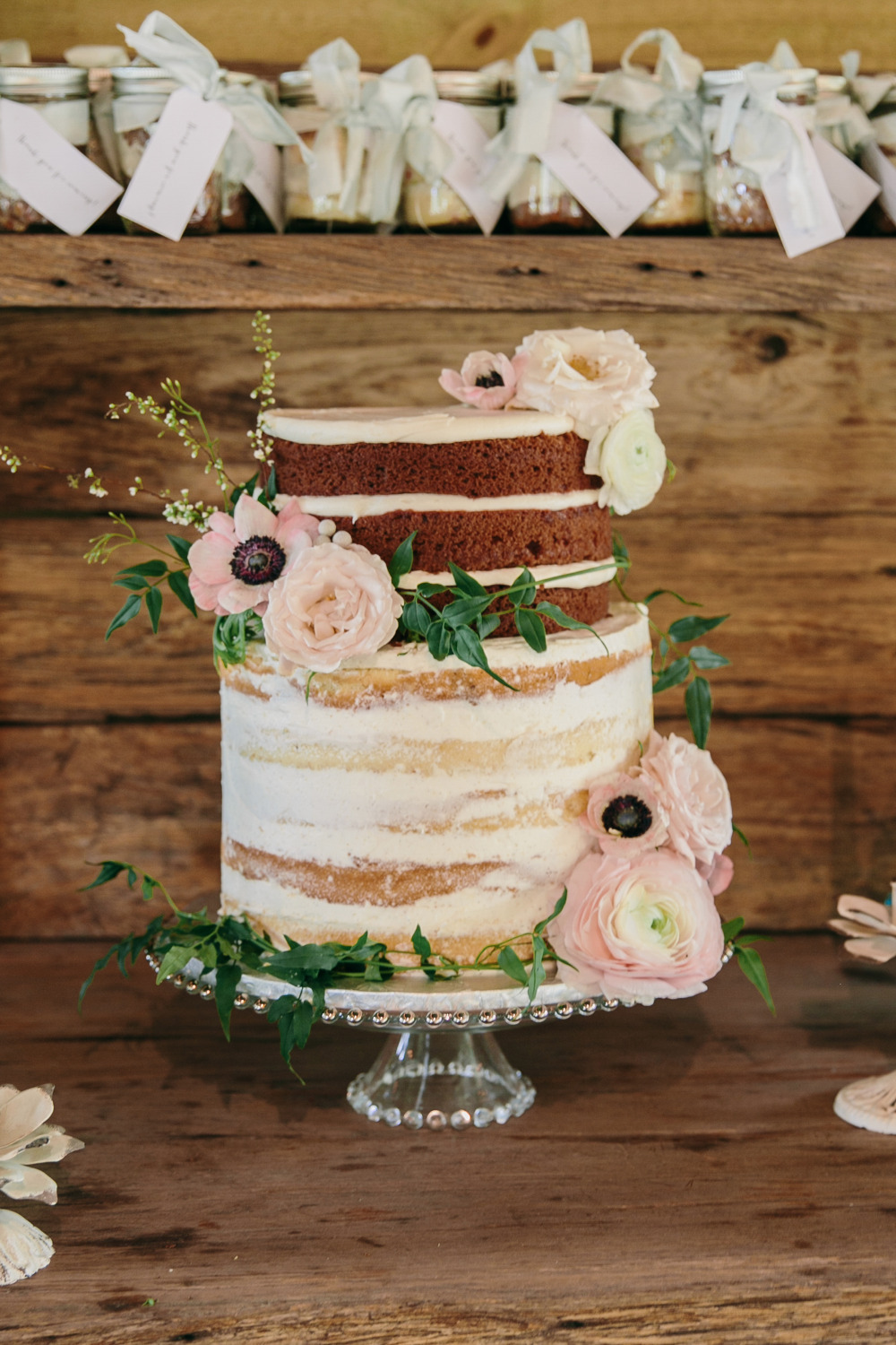 naked cake wedding cake with flowers