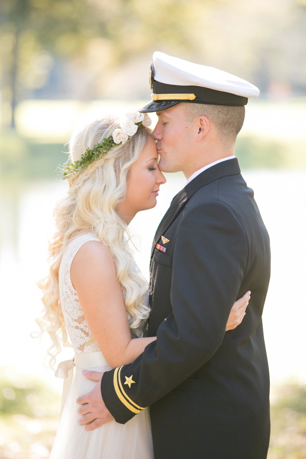 cute wedding kiss with groom in Navy uniform