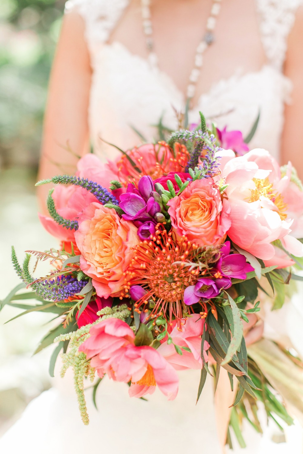 Bright orange pink and peach wedding bouquet