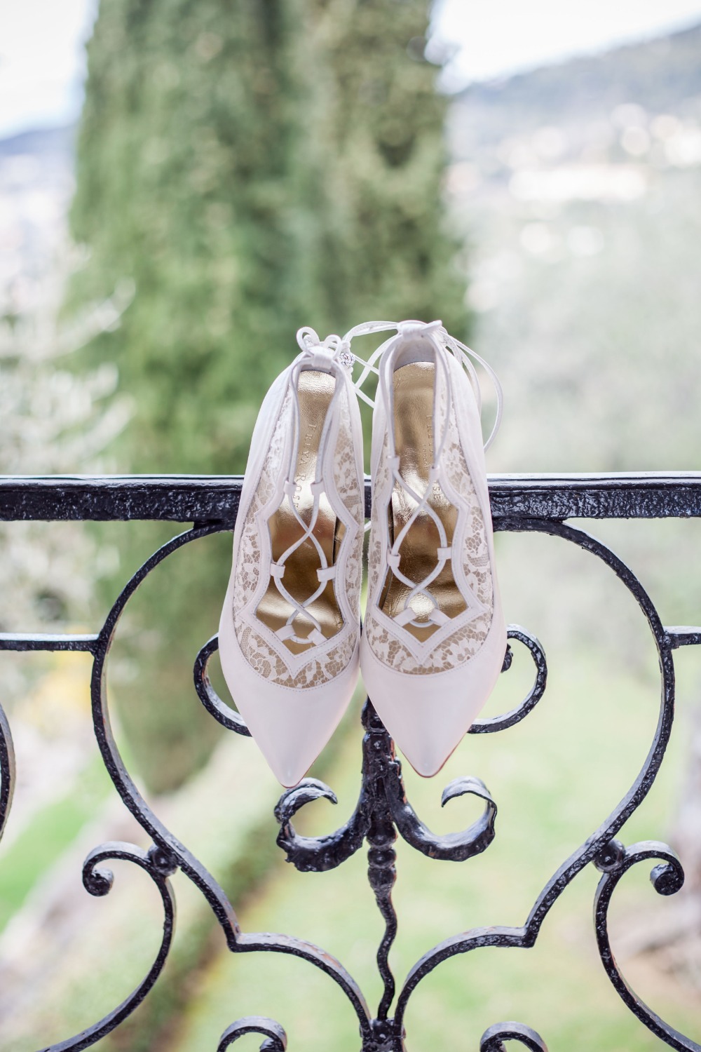Strappy white wedding heels