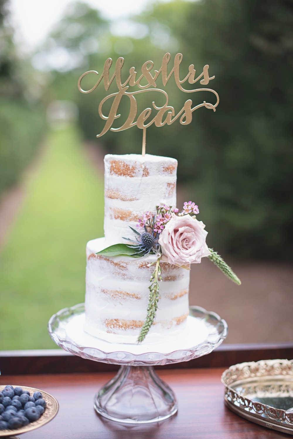 Two tier nearly naked cake
