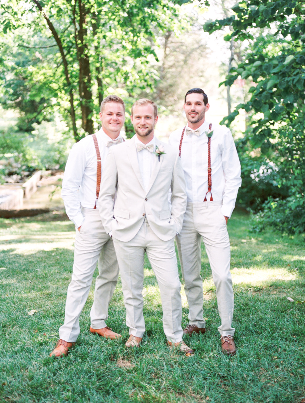neutral white groom and groomsmen attire