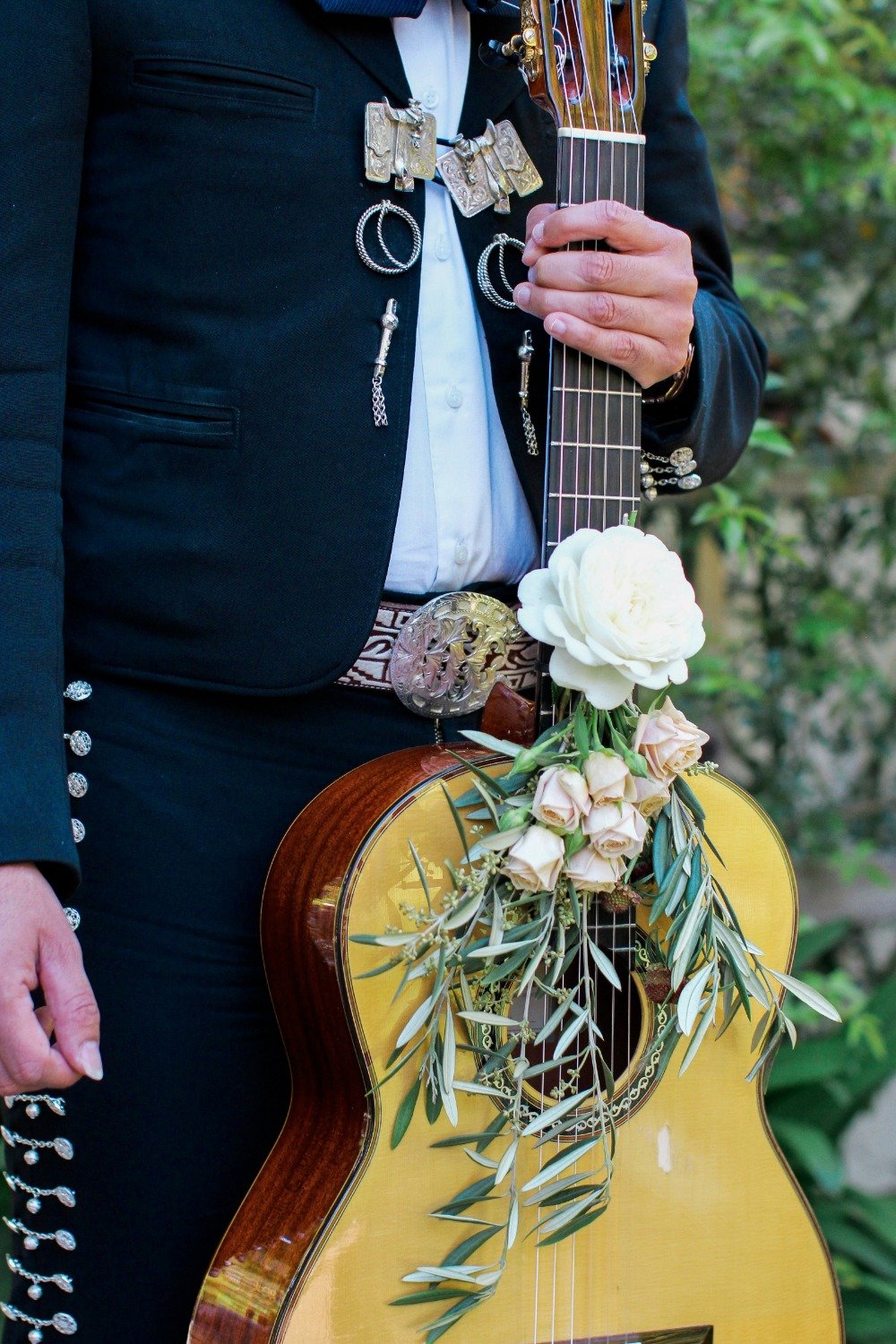 Wedding mariachi guitar with florals