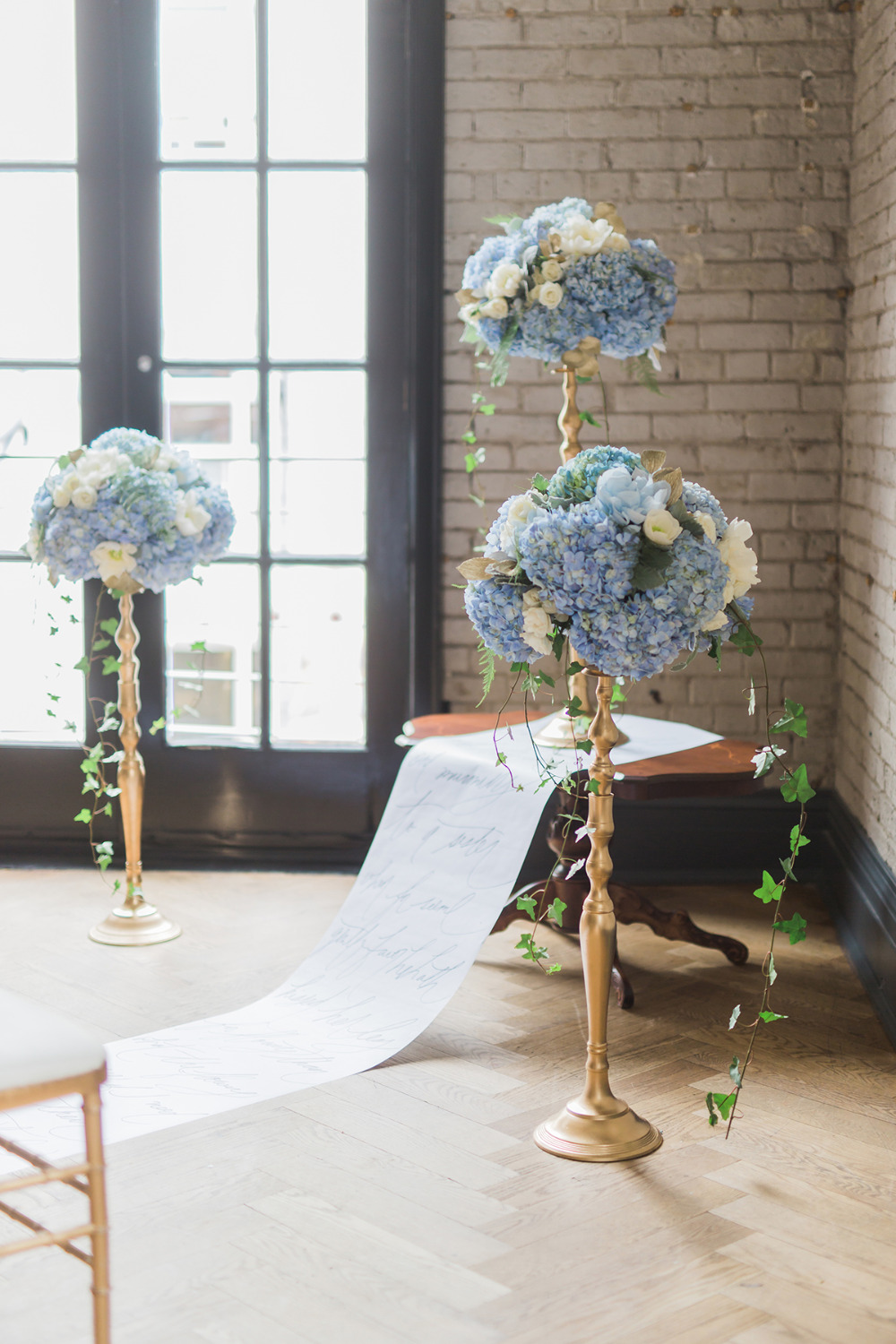 blue and gold floral wedding ceremony