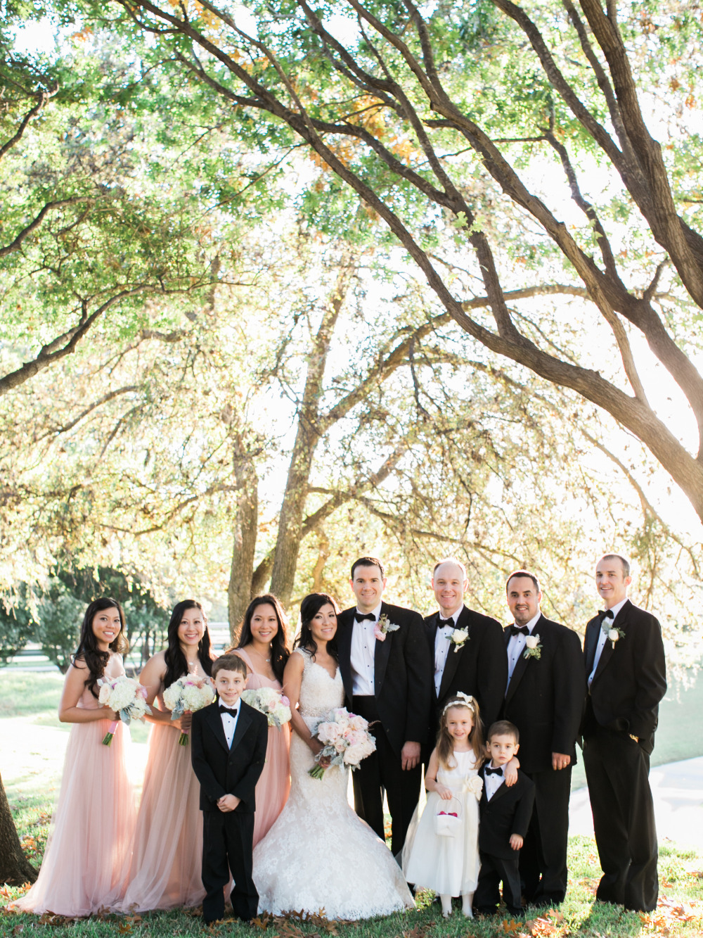 pink and black classic wedding party attire