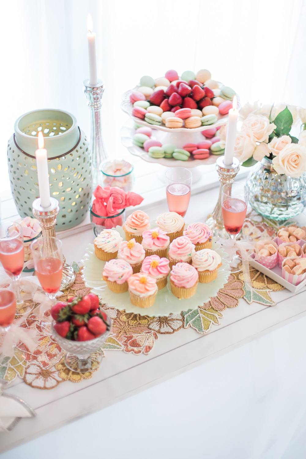 pink and mint dessert table with cupcakes