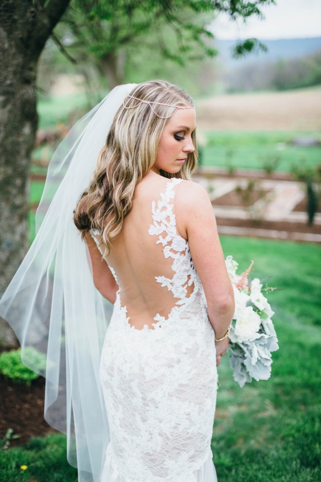 back showcasing wedding gown