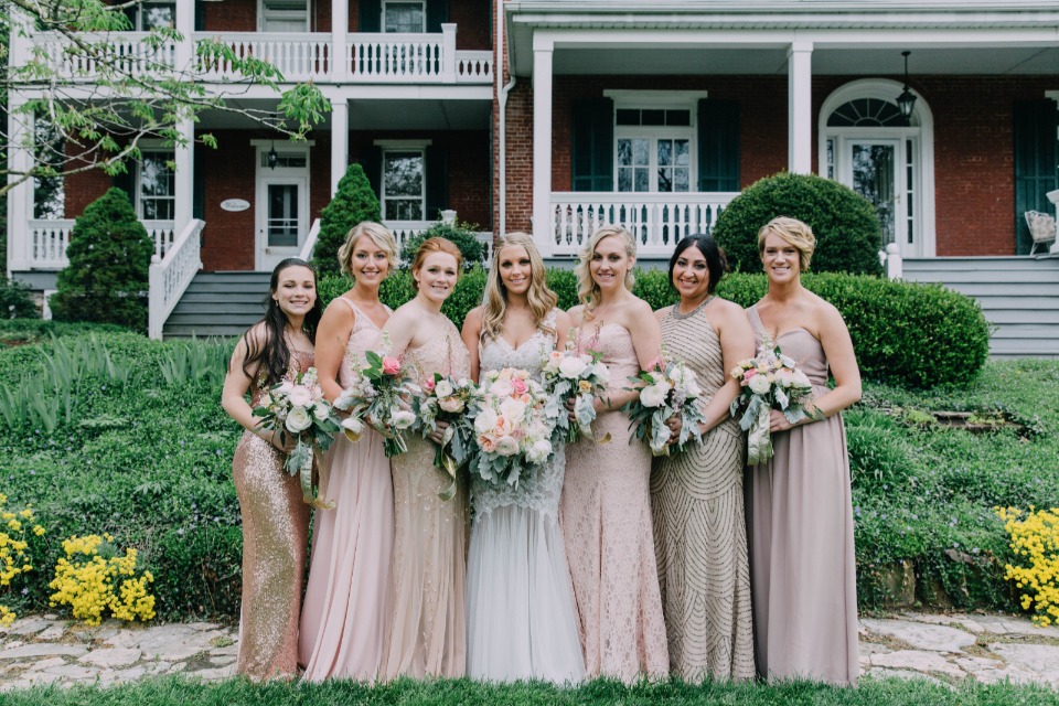 mismatched bridesmaid dresses in pink and champagne