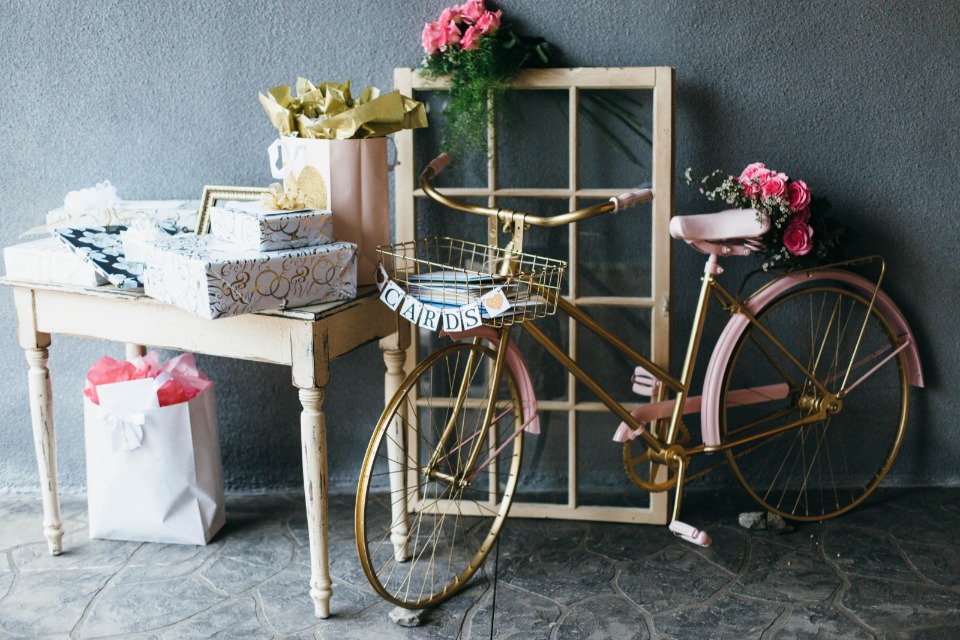gift and card table with vintage bicycle