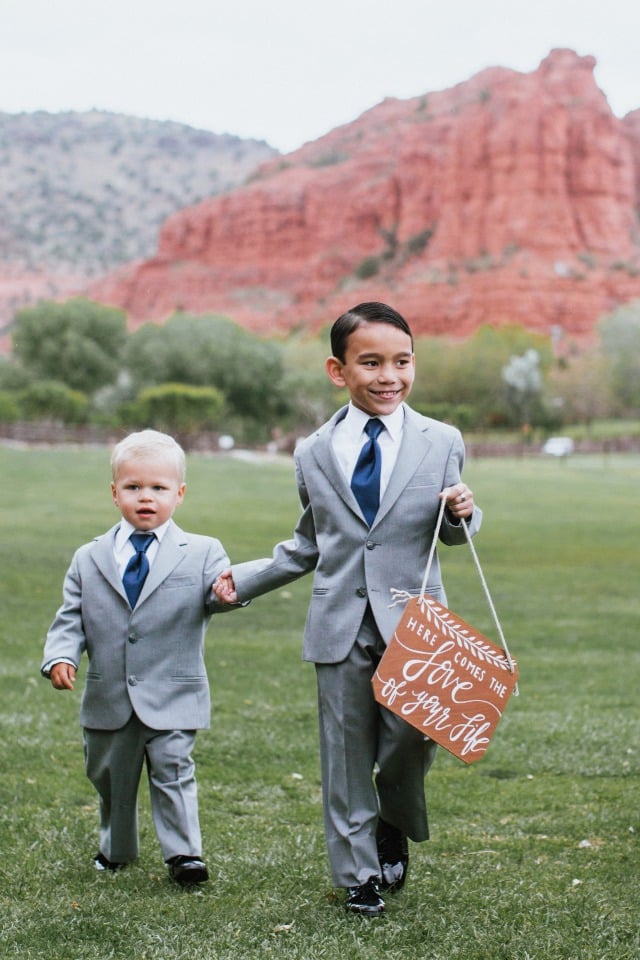 ring bearers in little grey suits