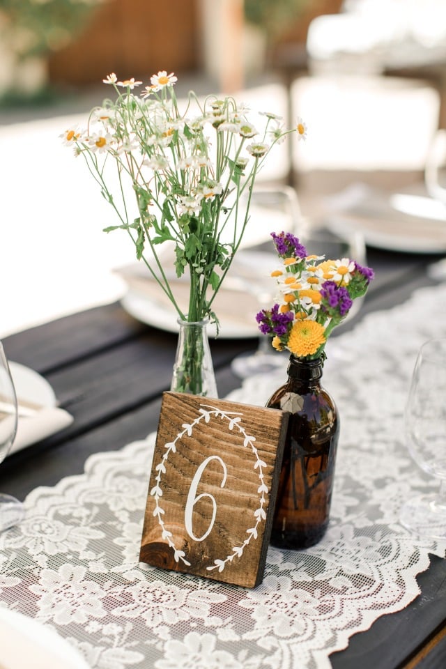 wooden block table number and wild flower centerpiece