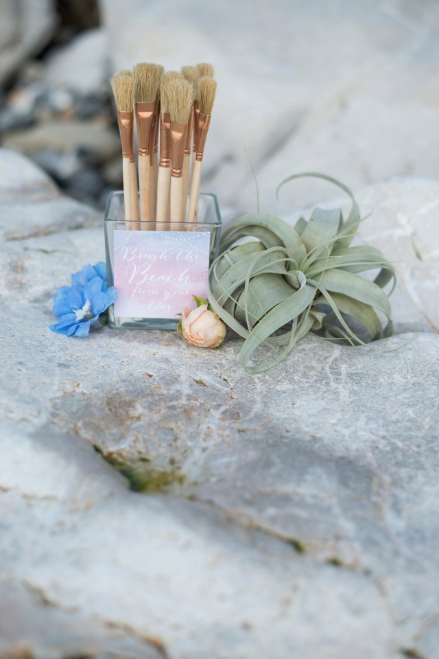 beach brushes to help guests brush away the sand