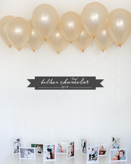 DIY balloon chandelier with hanging photos display