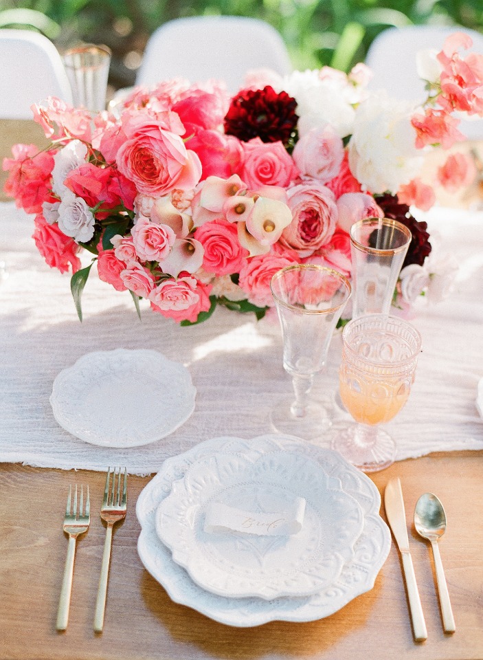 chic pink and gold wedding table with a vintage vibe