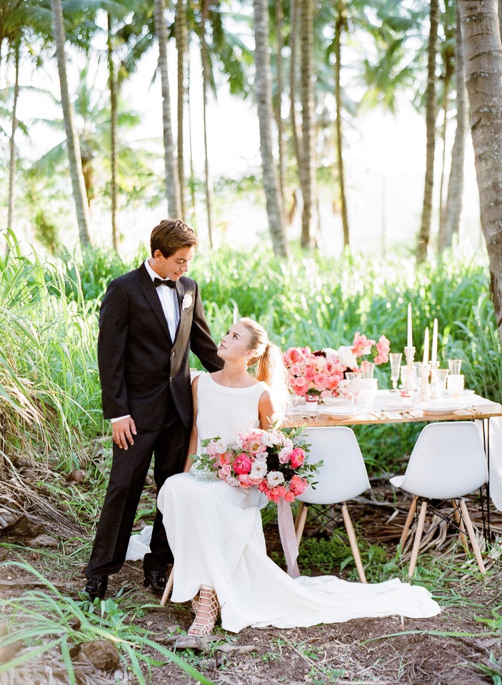 formal bride and groom at tropical forest wedding reception