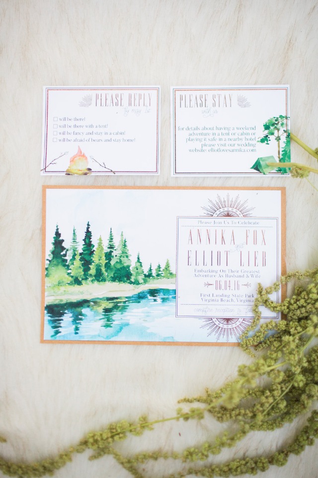Rustic wedding invitation with watercolor forest lake scene