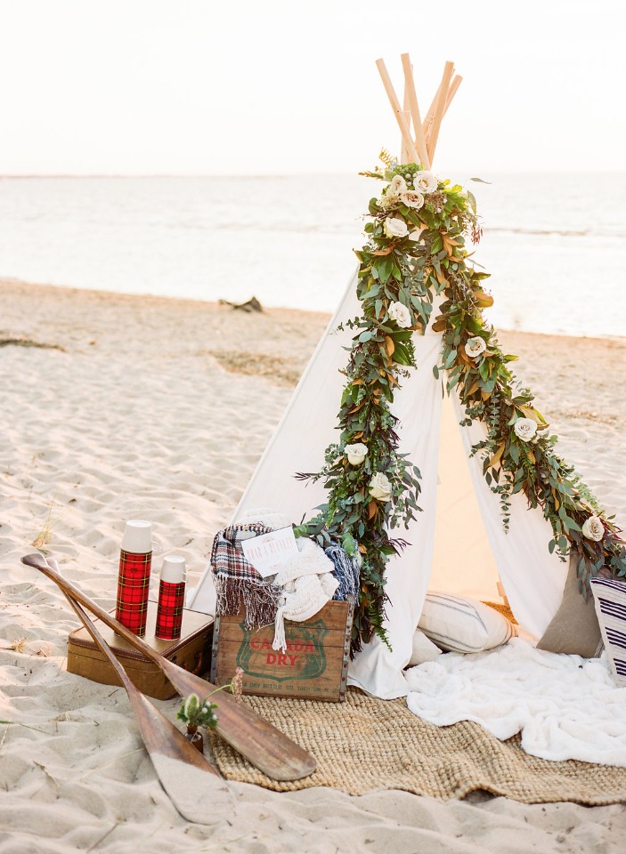 garland draped beach tent with vintage details