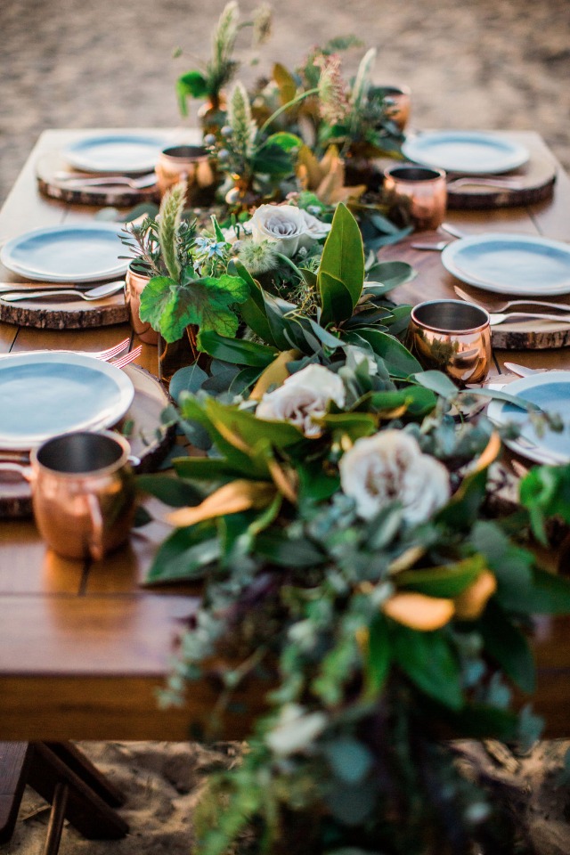 over grown greenery cascading garland table centerpiece