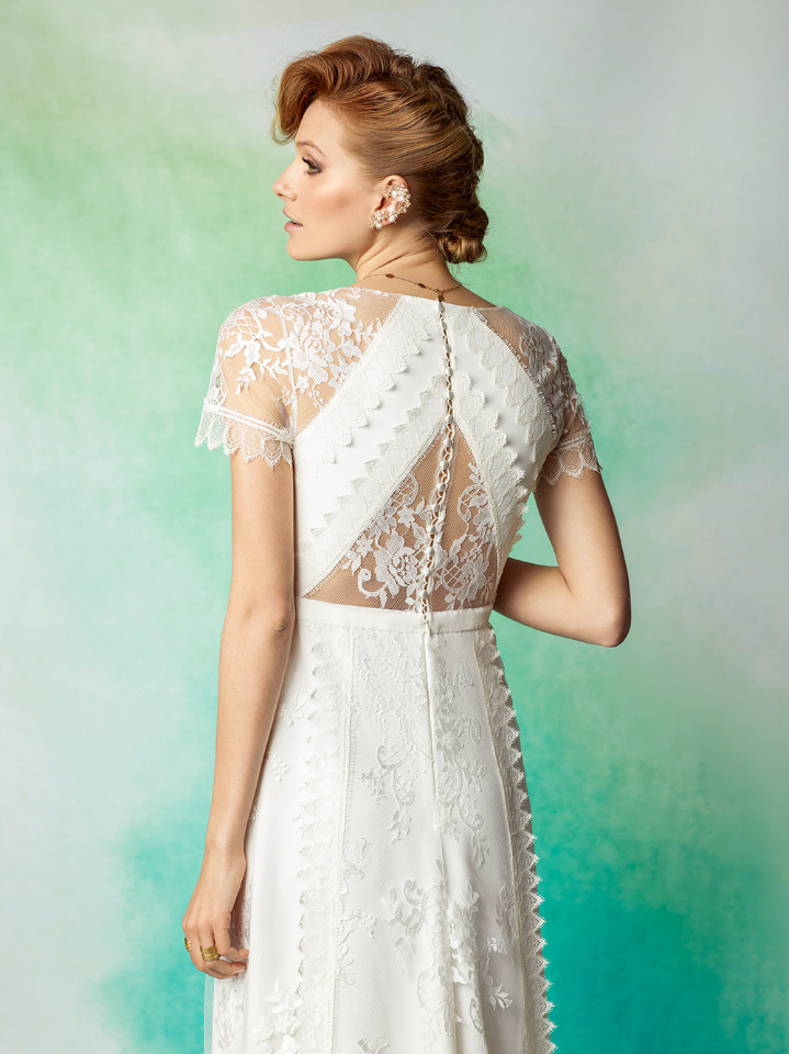 Elegant lace wedding dress with open back detail
