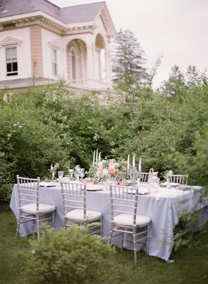 Elegant garden wedding table setting with floral decor