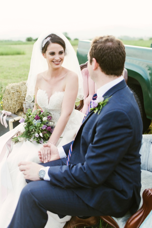 Happy bride and groom share a loving moment on their wedding day