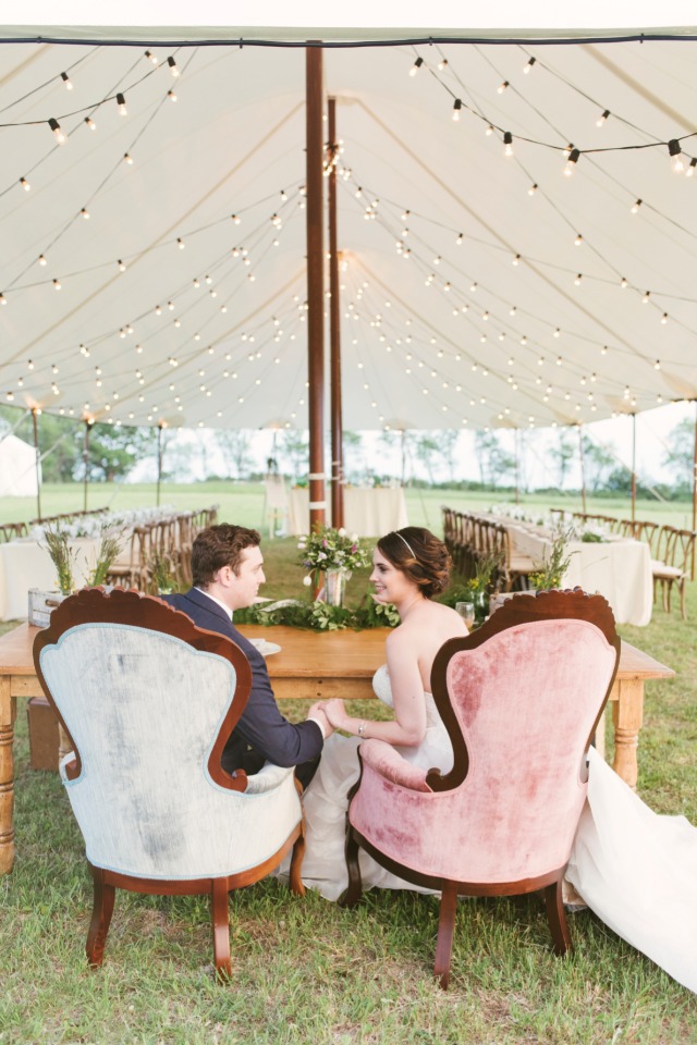 Romantic outdoor wedding with couple under string lights