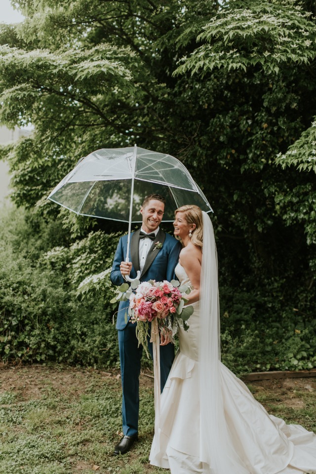 cute rainy day wedding photo