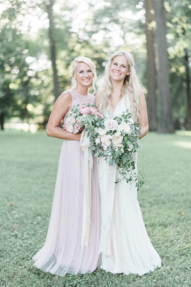bridesmaid in soft pink dress from BHLDN