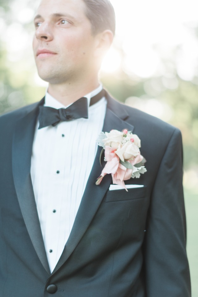 formal groom in tuxedo