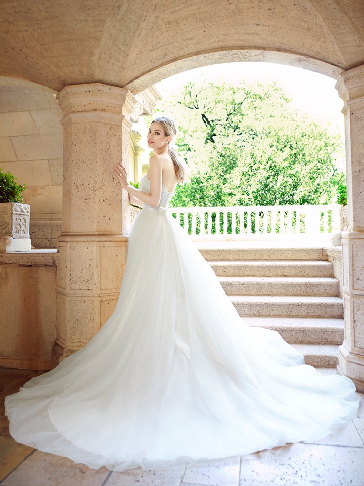 Elegant bride in a flowing wedding gown