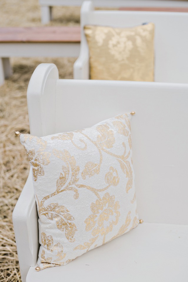 soften up those hard pews with a few gold and white accent pillows