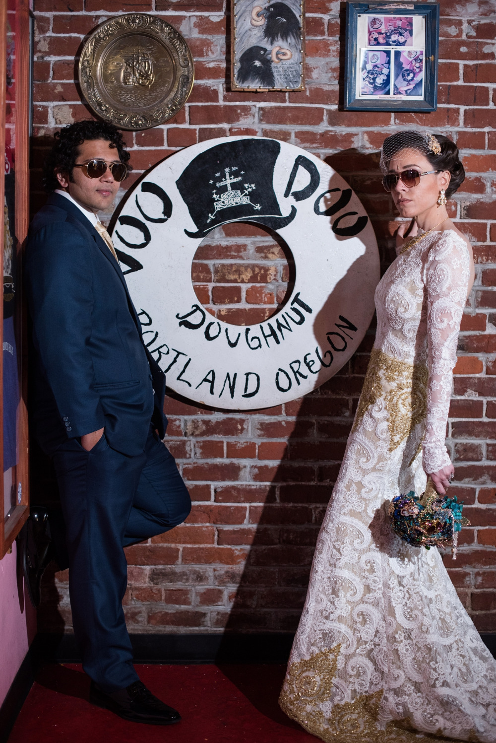 Stylish couple at Voodoo Doughnut Portland wedding photo