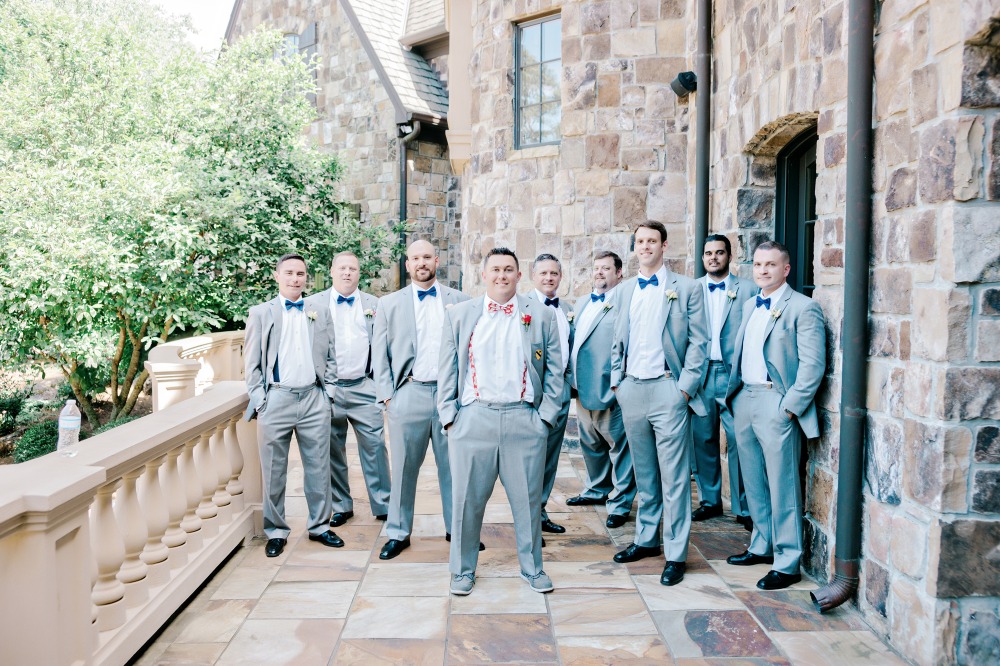 Grey groomsmen suits with bowties
