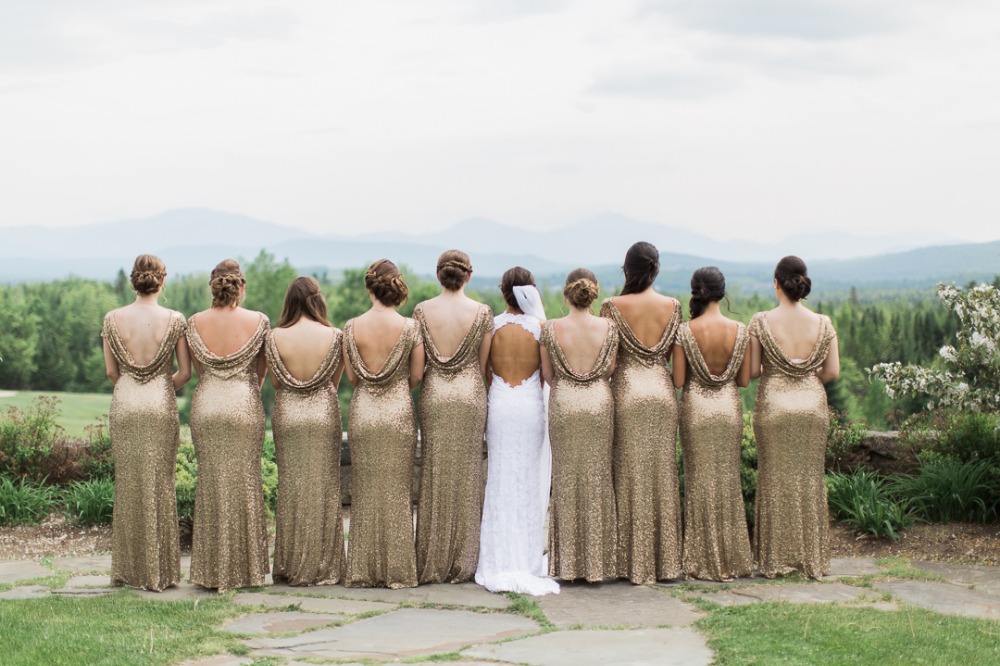 Bridesmaids in gold dresses with bride wedding day