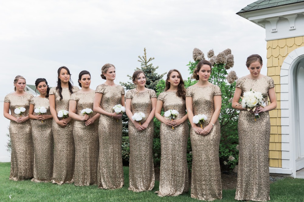 Bridesmaids in sparkly gold dresses