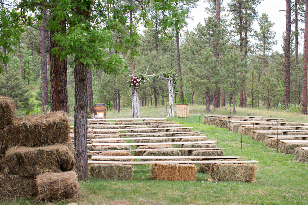 haybale and plank wedding ceremony seating idea