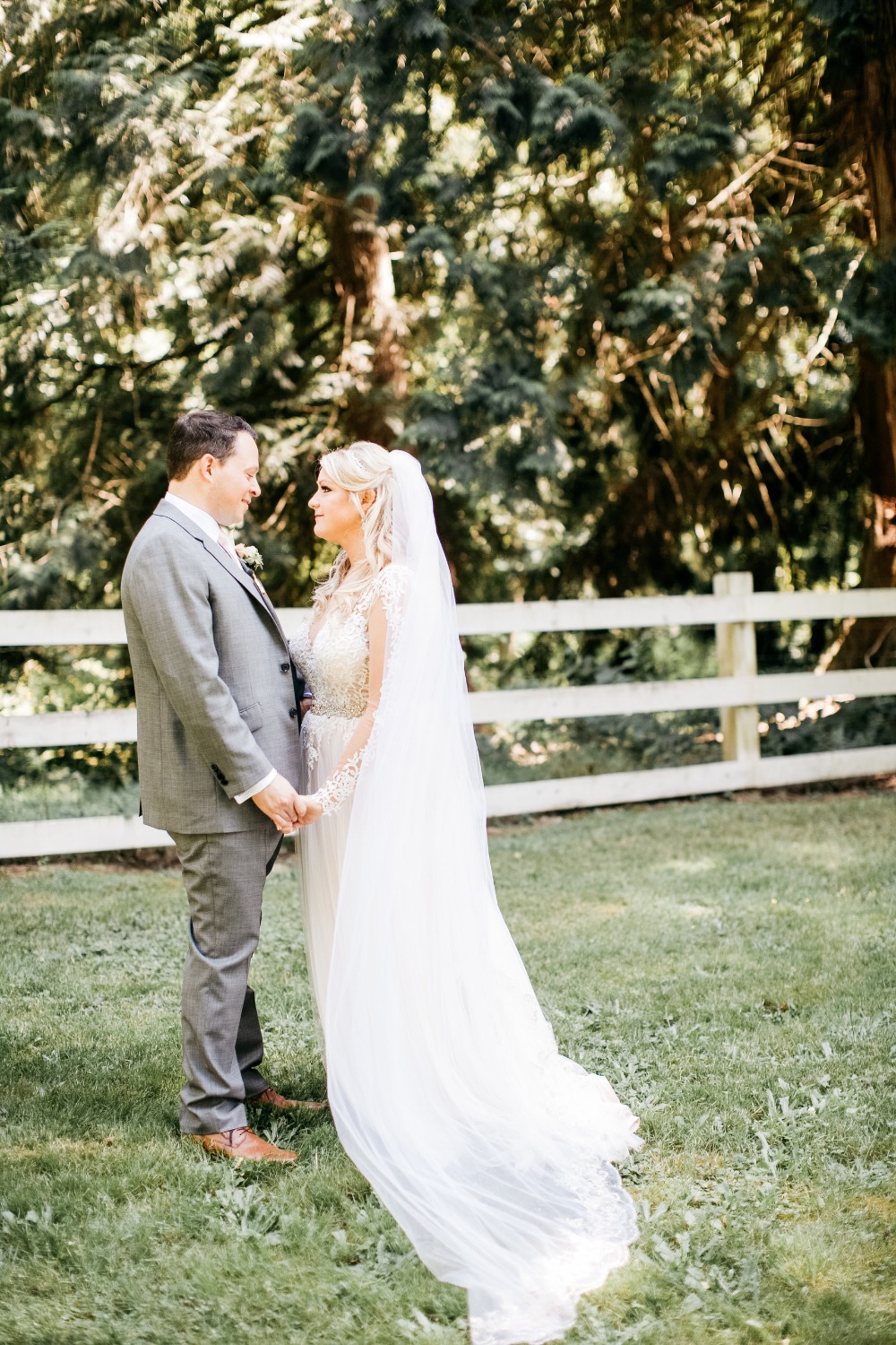 Bride and groom holding hands on their wedding day