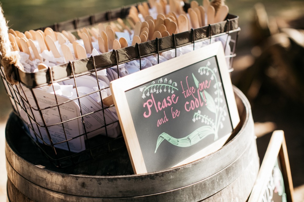Wedding fans with sign Please take one and be cool