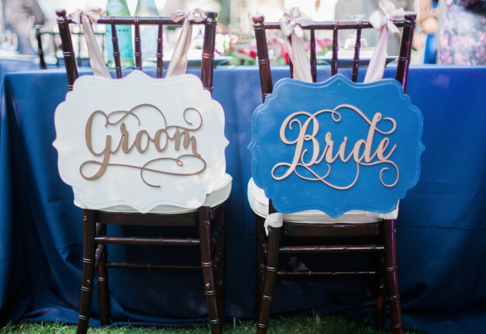 Bride and groom sign