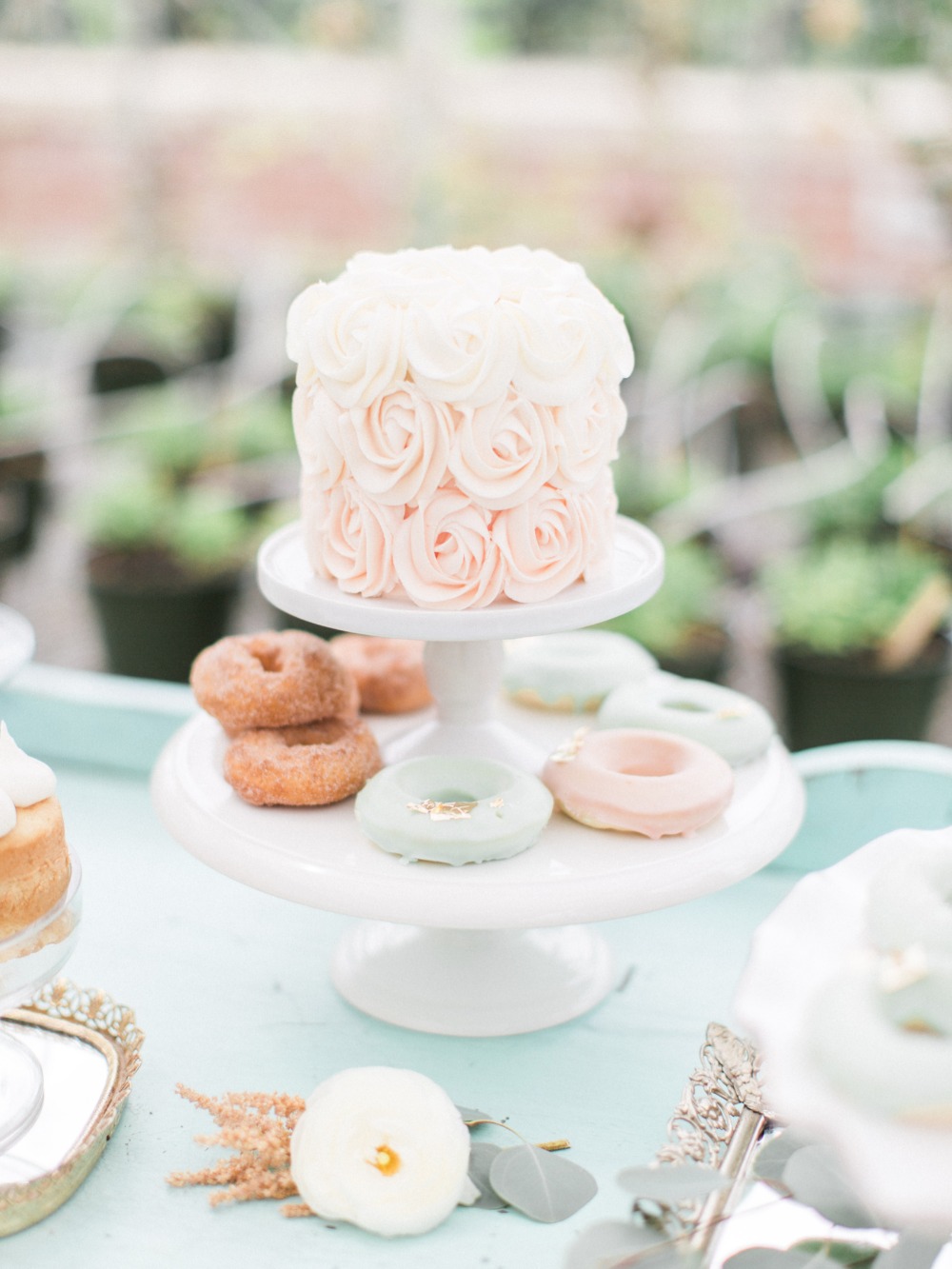 Mini wedding cake with rose icing