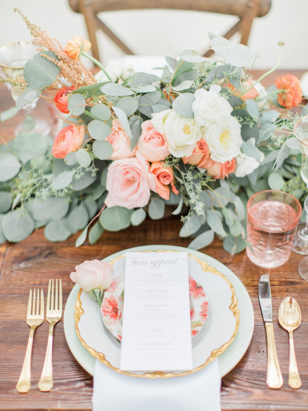 Stylish table decor and gold rimmed plates