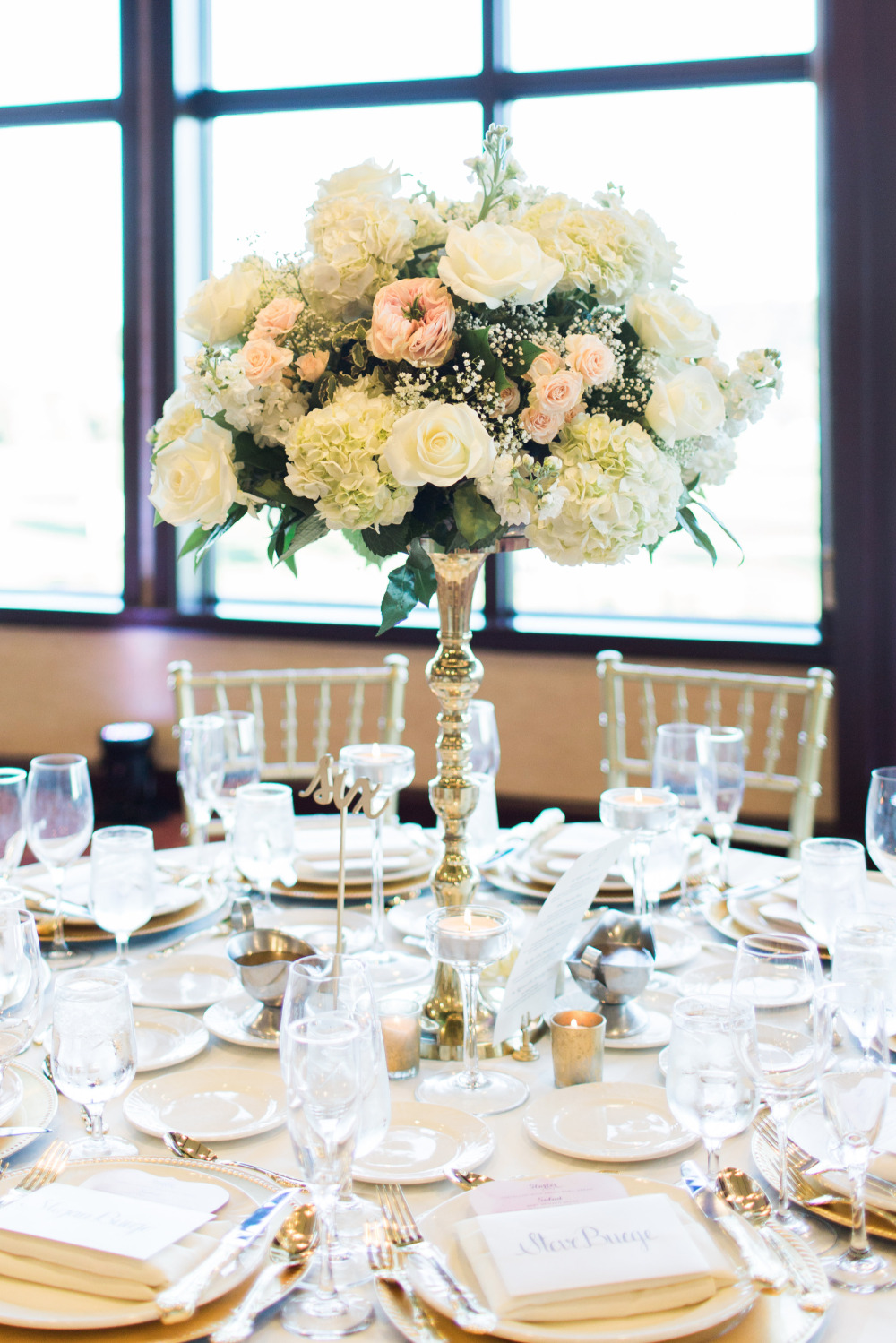 white and pink tall wedding centerpieces