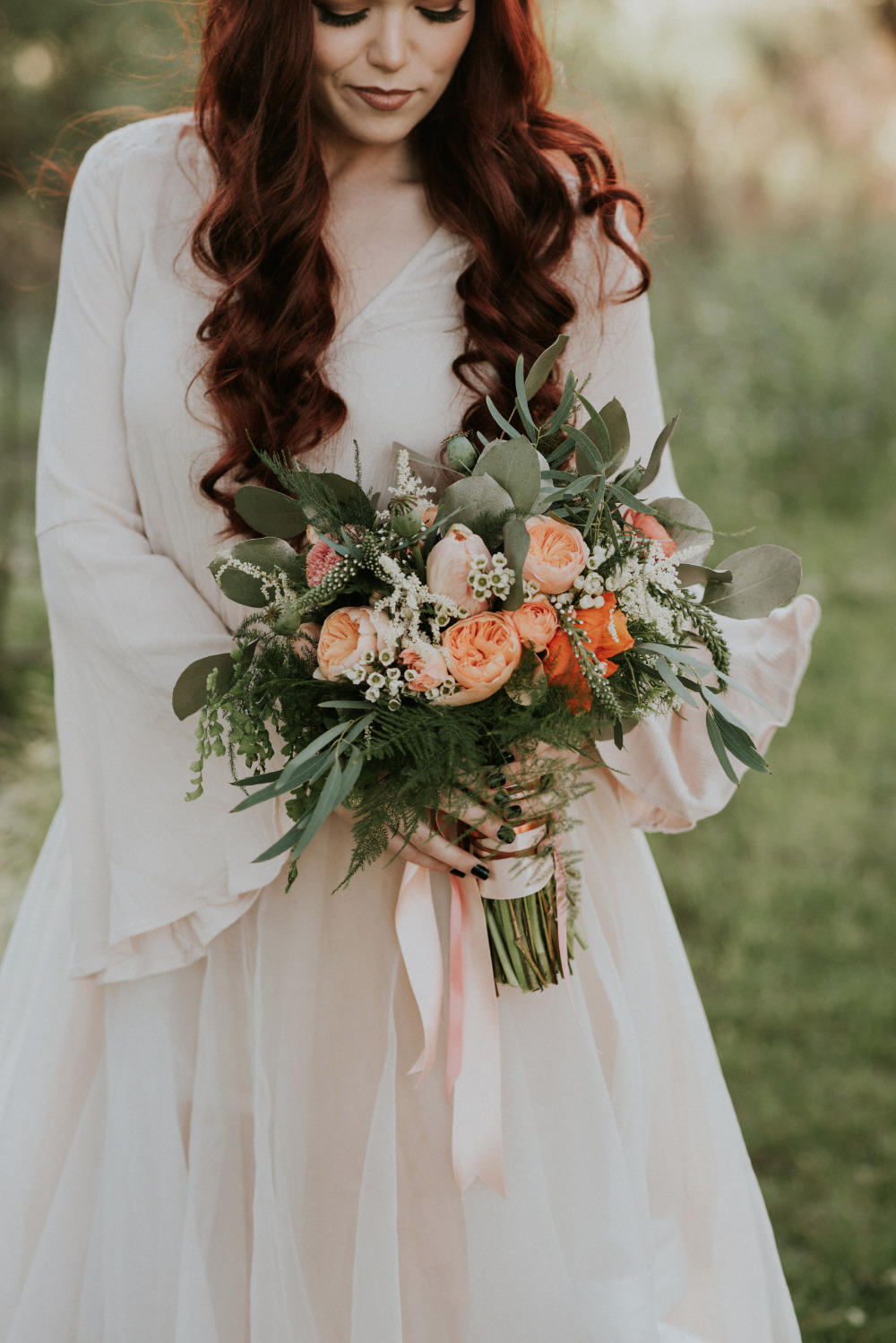 beautiful peach and orange wedding bouquet