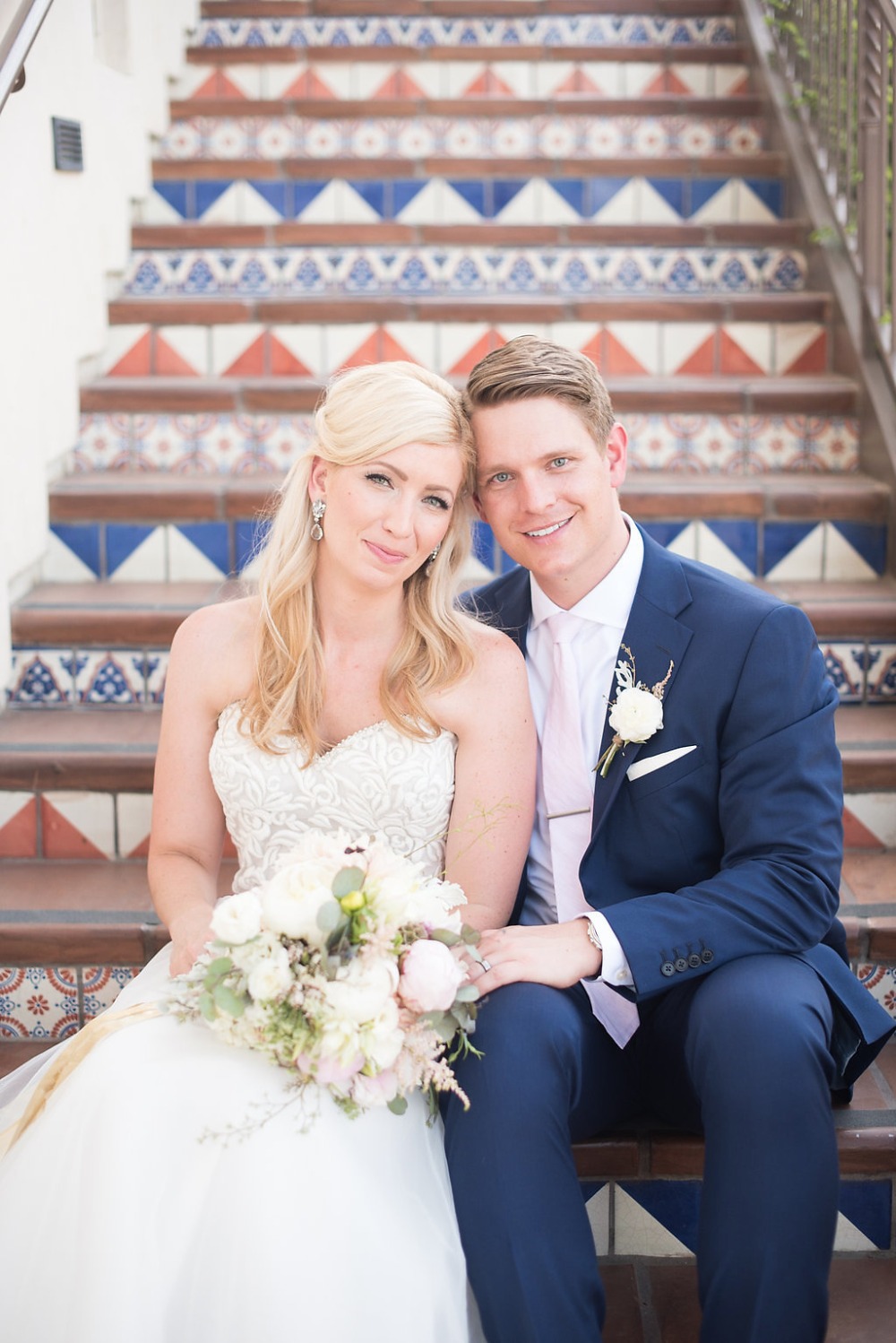 bride and groom in a stairwell