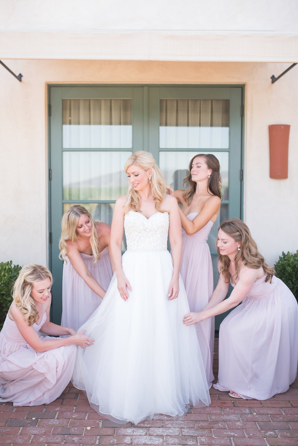 the bride in a beautiful Madison James wedding dress