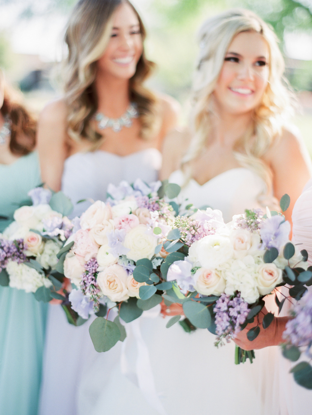 pretty purple pink and white wedding bouquets