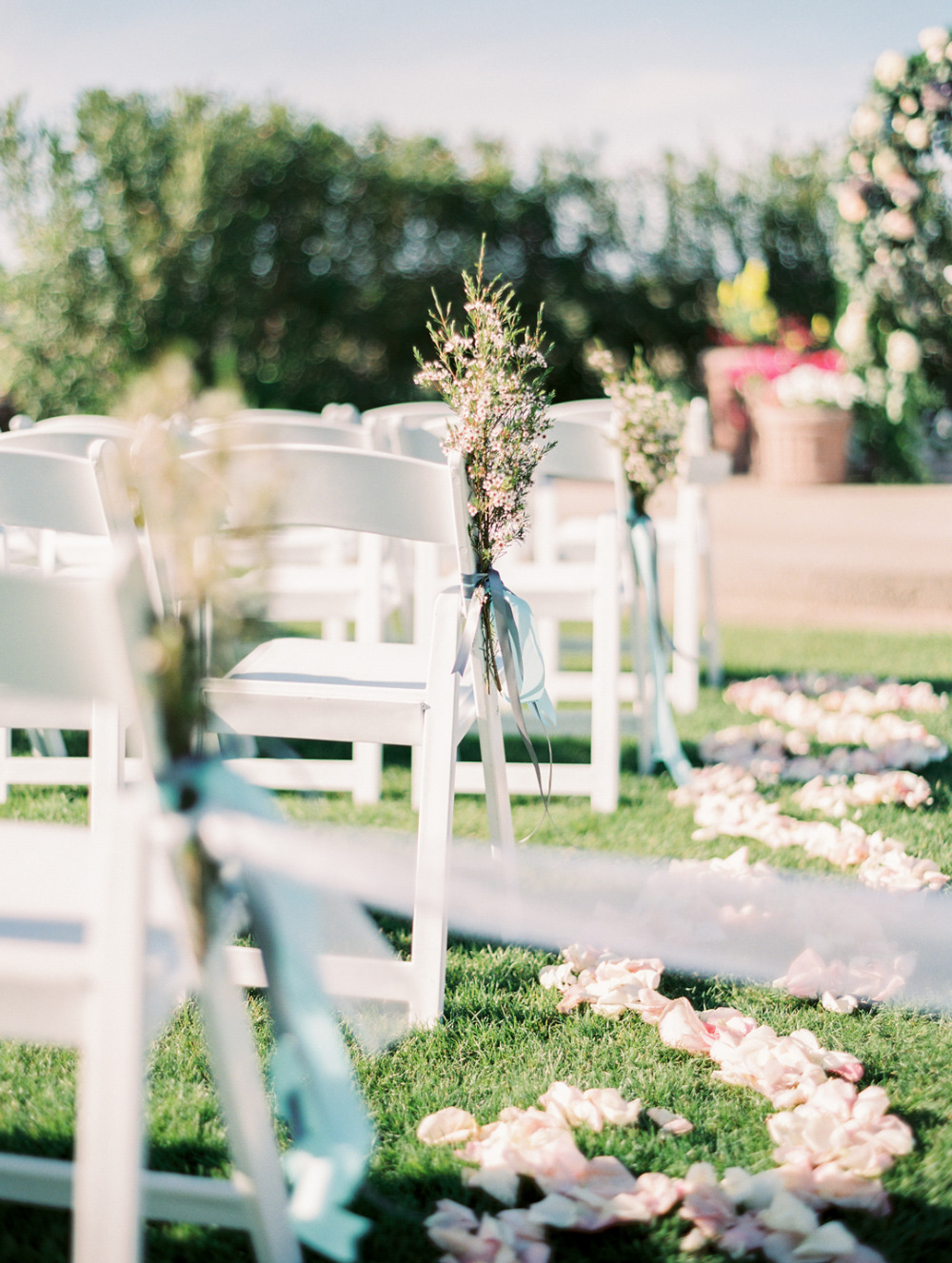 petal wedding aisle and flower chair decor