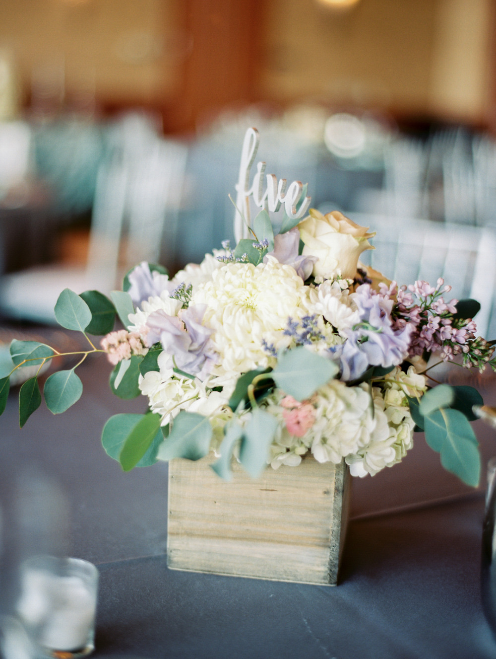 wood box wedding flower centerpiece and table number