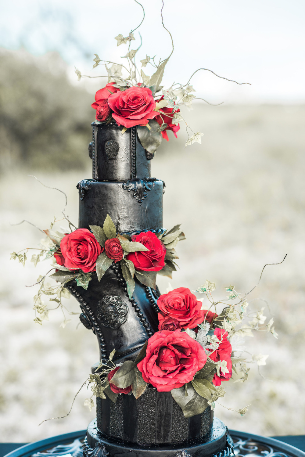 black and red twisted wedding cake